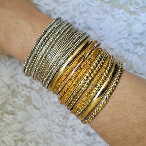 Lot of silver and gold toned bangles 25+
